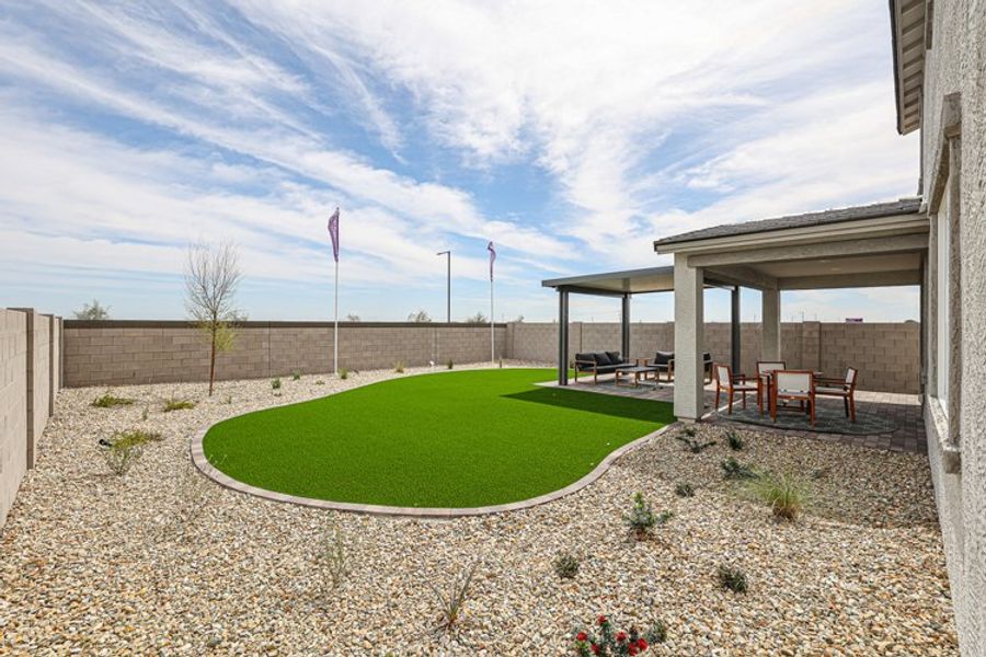 A large green lawn. A large green lawn.