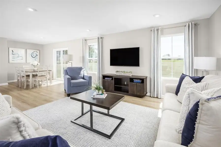 Furnished interior view inside a new home in Wren Woods 2-Story, Gray Court (Image 8). Furnished interior view inside a new home in Wren Woods 2-Story, Gray Court (Image 8).