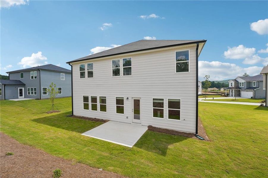 Exterior details and patio area of a home in Northwoods at Mirror Lake, Villa Rica (Image 29).