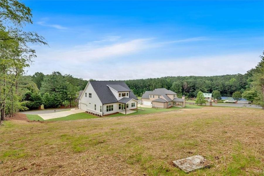 Front exterior of a new home in , Rome, GA, highlighting curb appeal (Image 2).