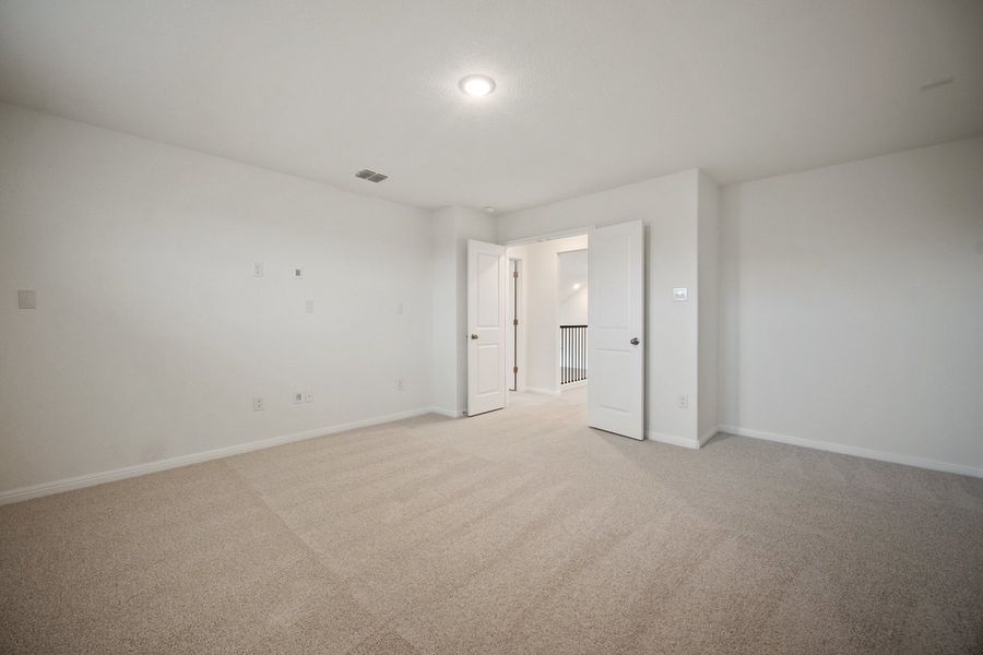 Spacious, unfurnished interior of a new home in The Hills of Bear Creek, Manchaca (Image 22).