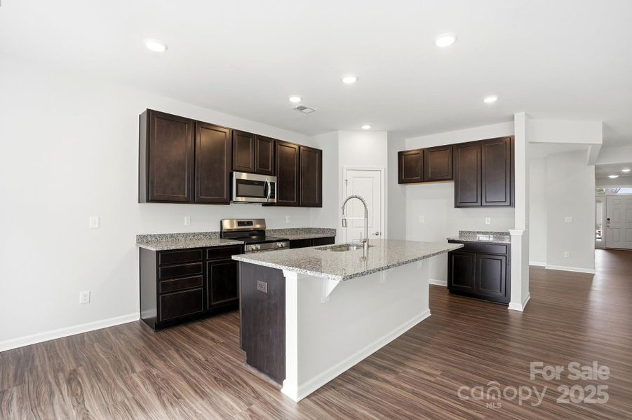 Furnished interior view inside a new home in Villas at Prestwick, Mooresville (Image 11).