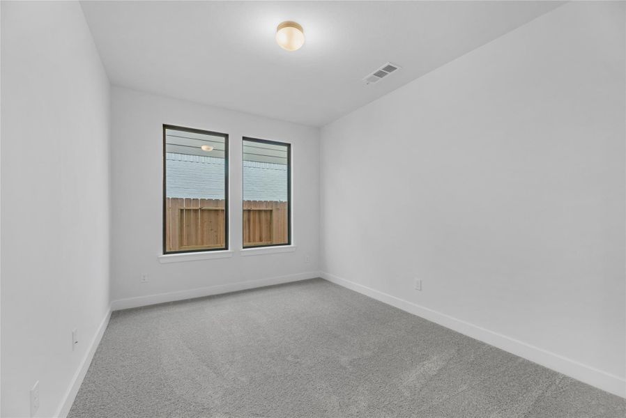 Spacious, unfurnished interior of a new home in Sienna, Missouri City (Image 19).