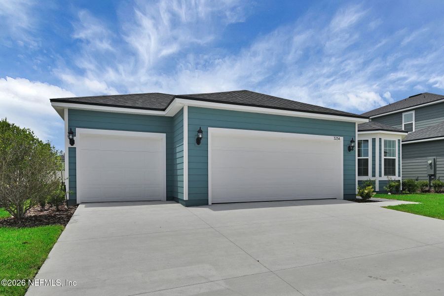 Front exterior of a new home in Hyland Trail, Green Cove Springs, FL, highlighting curb appeal (Image 28).