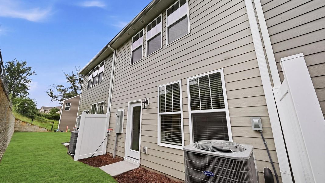 Exterior details and patio area of a home in Clayton Crossing, Arden (Image 4).