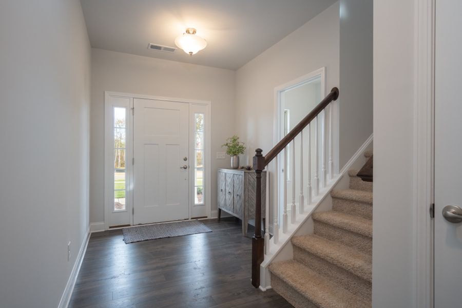 Representative unfurnished interior of a home built from the 3030 by Adams Homes in Parkland Place, Pace (Image 18).