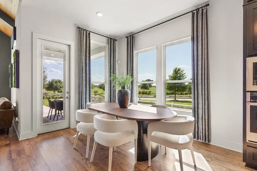 Representative furnished interior of a home built from the Madison – 50′ Lot by Chesmar Homes in Lakes of Cane Island, Katy (Image 5).