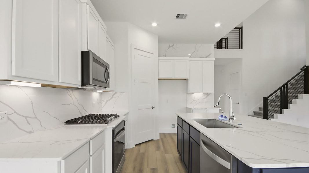 Furnished interior view inside a new home in Hills of Westlake, Conroe (Image 8).