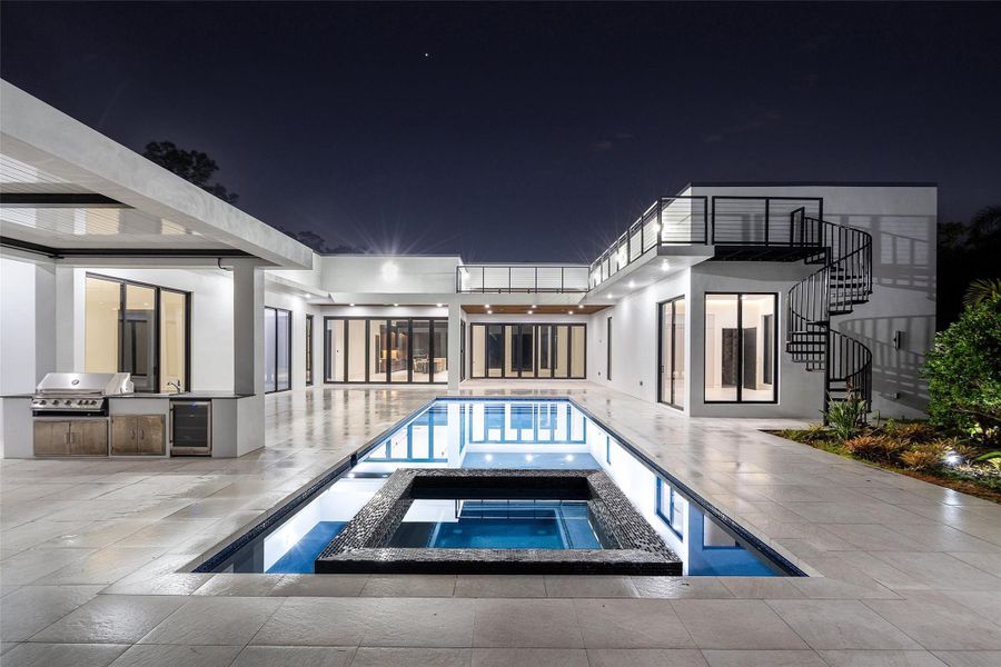 Exterior details and patio area of a home in , Parkland (Image 36).