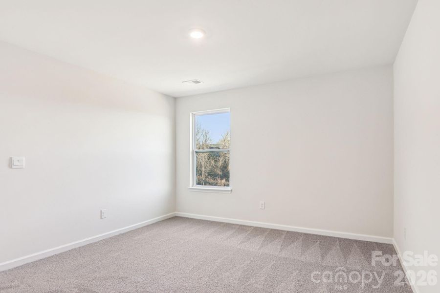 Spacious, unfurnished interior of a new home in Rydele Heights, Asheville (Image 27).