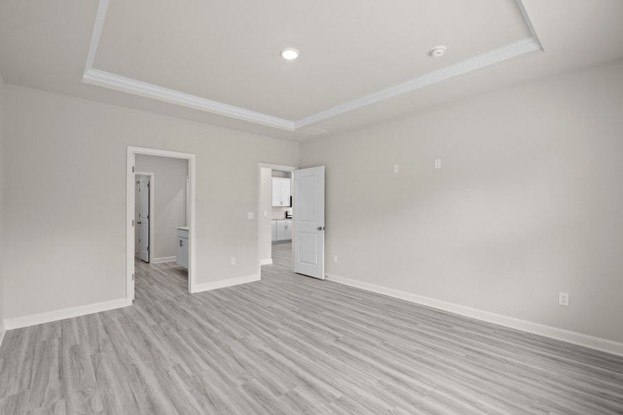 Spacious, unfurnished interior of a new home in Cypress Ridge - The Coastline Series, Longs (Image 24).