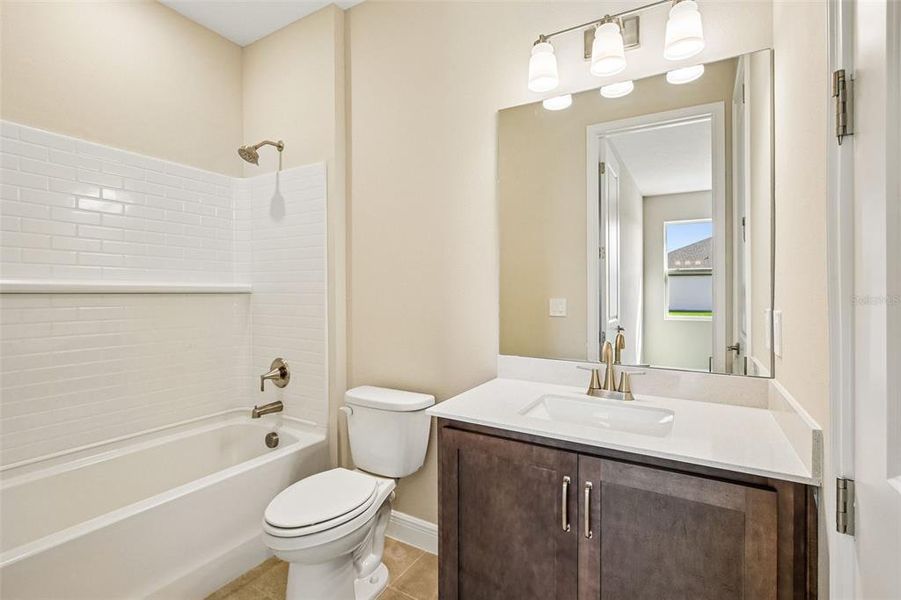 Furnished interior view inside a new home in Oakfield Trails, Parrish (Image 12).