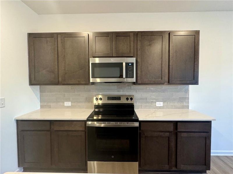 Furnished interior view inside a new home in Eastlyn Crossing, Flowery Branch (Image 10). Furnished interior view inside a new home in Eastlyn Crossing, Flowery Branch (Image 10).