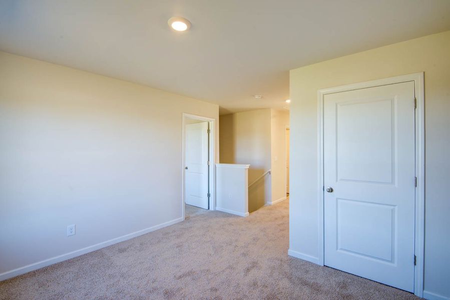 Representative unfurnished interior of a home built from the Penwell by D.R. Horton in Carter Ridge, Greenville (Image 20).