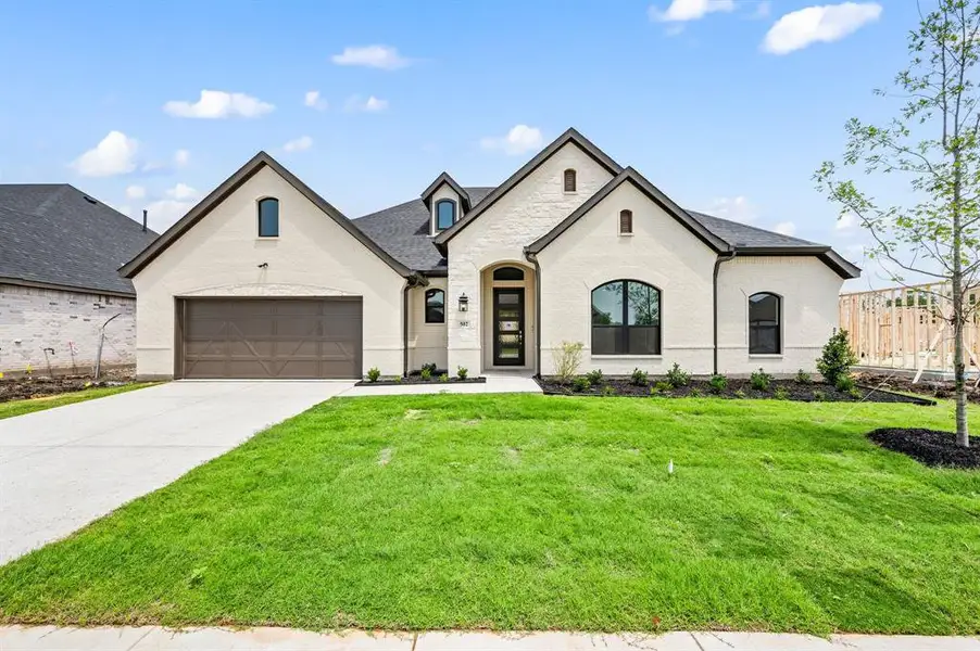 Front exterior of a new home in LeTara, Haslet, TX, highlighting curb appeal (Image 1).
