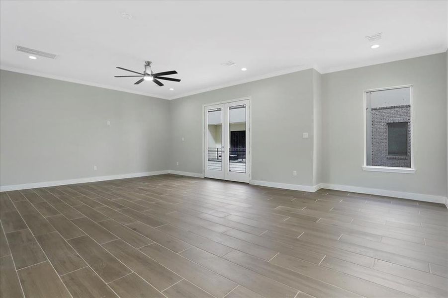 This home is lit with recessed lighting and timeless fixtures throughout.