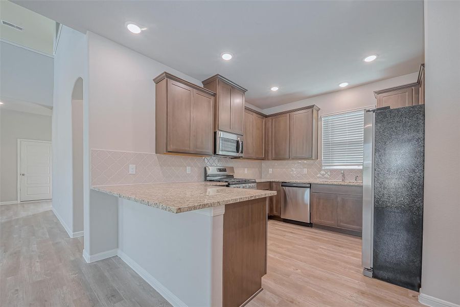Furnished interior view inside a new home in Sunterra, Katy (Image 6). Furnished interior view inside a new home in Sunterra, Katy (Image 6).