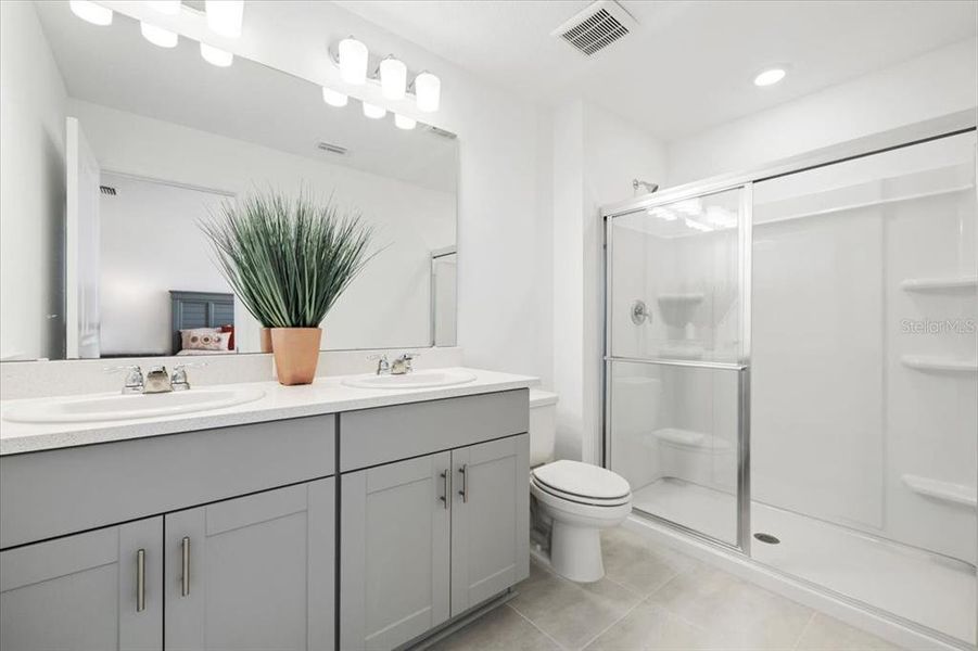 Furnished interior in a model home at The Townhomes at Azario Lakewood Ranch in Bradenton (Image 10).