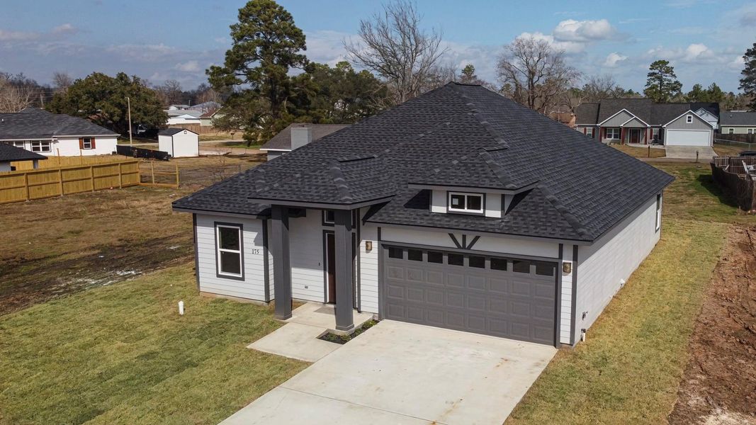 Front exterior of a new home in , Livingston, TX, highlighting curb appeal (Image 24). Front exterior of a new home in , Livingston, TX, highlighting curb appeal (Image 24).
