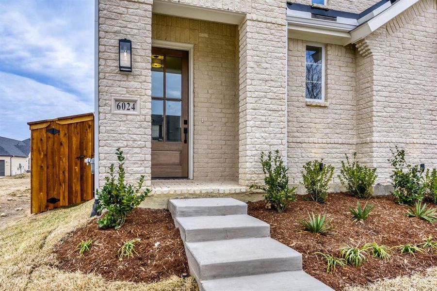 View of exterior entry featuring brick siding View of exterior entry featuring brick siding