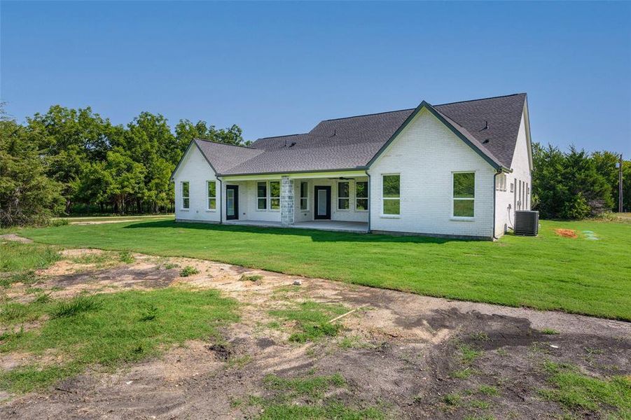 Front exterior of a new home in , Farmersville, TX, highlighting curb appeal (Image 24).