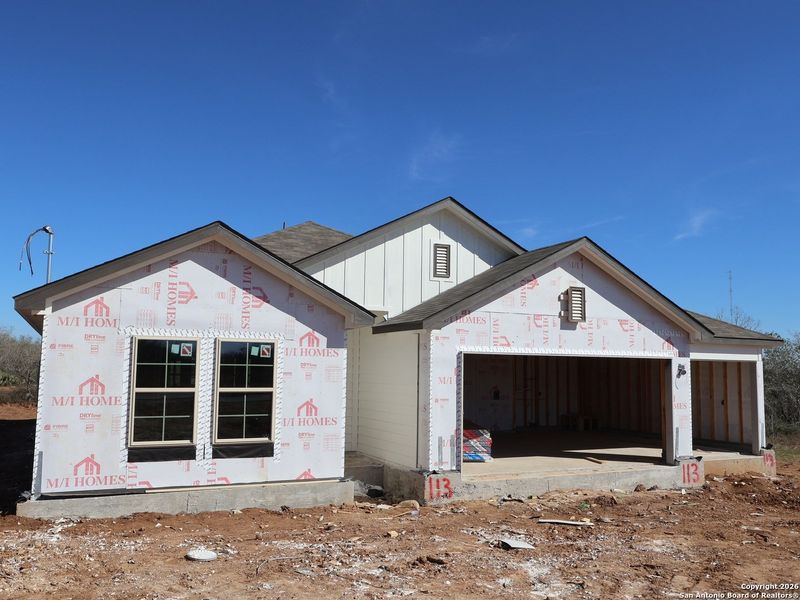 In-progress construction of a new home in Chaparral Ranch, Floresville, TX (Image 32).