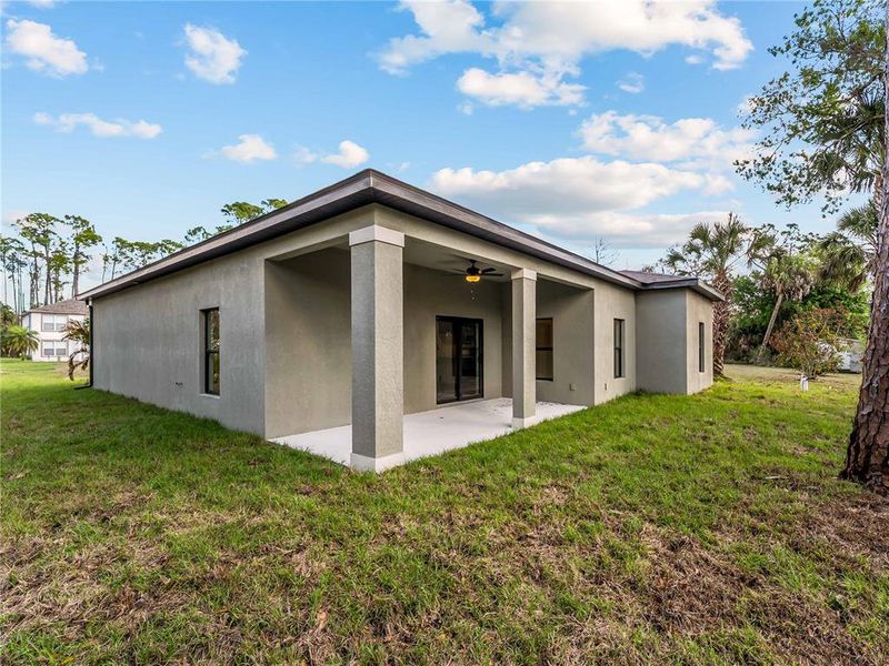 Exterior details and patio area of a home in , North Port (Image 32).