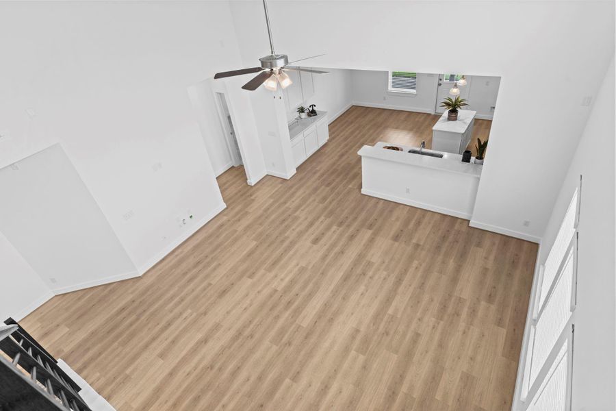 Another view from above showcases the seamless flow between the main living, kitchen, and dining areas—emphasizing the home’s open-concept design. **Image Representative of Plan Only and May Vary as Built**.