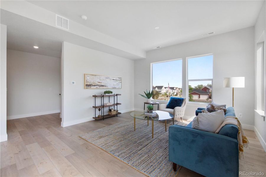 Furnished interior view inside a new home in Dillon Pointe - Skyview, Broomfield (Image 5).