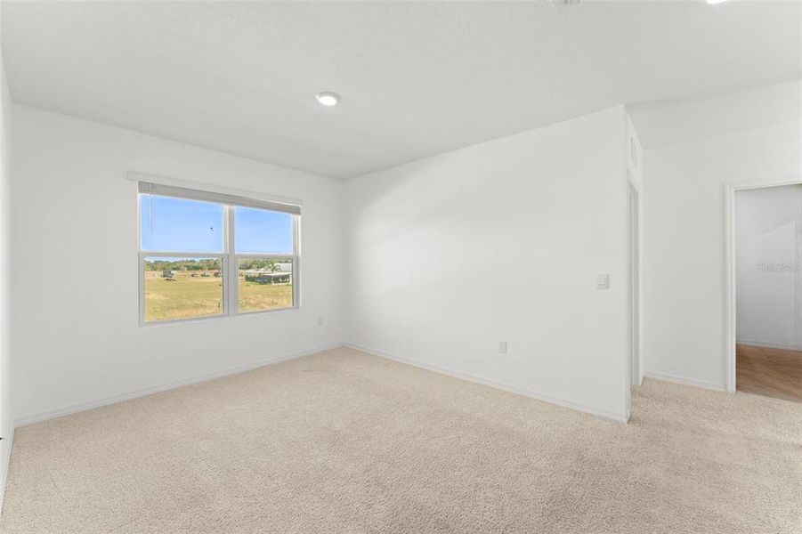 Spacious, unfurnished interior of a new home in Grace Ranch, Haines City (Image 20). Spacious, unfurnished interior of a new home in Grace Ranch, Haines City (Image 20).