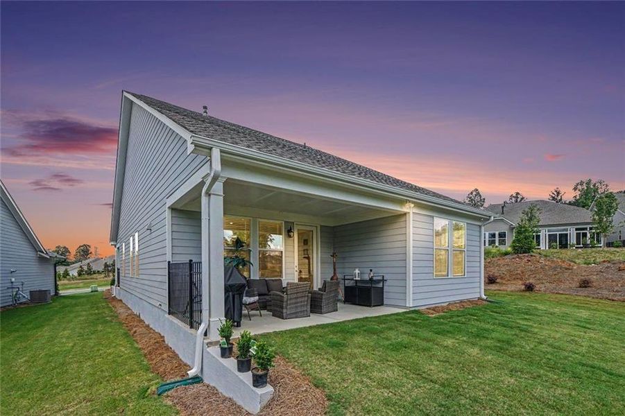 Exterior details and patio area of a home in , Hoschton (Image 25).