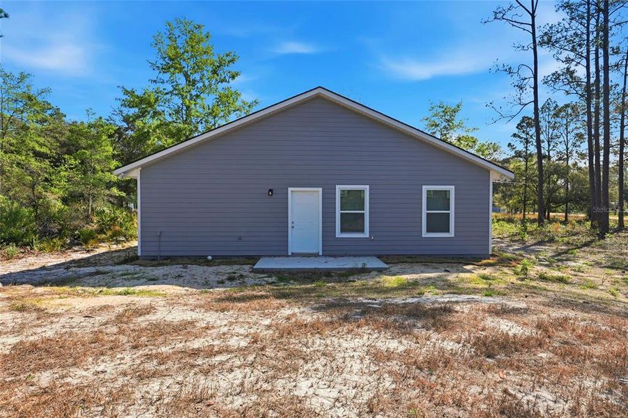 Exterior details and patio area of a home in , Interlachen (Image 3).