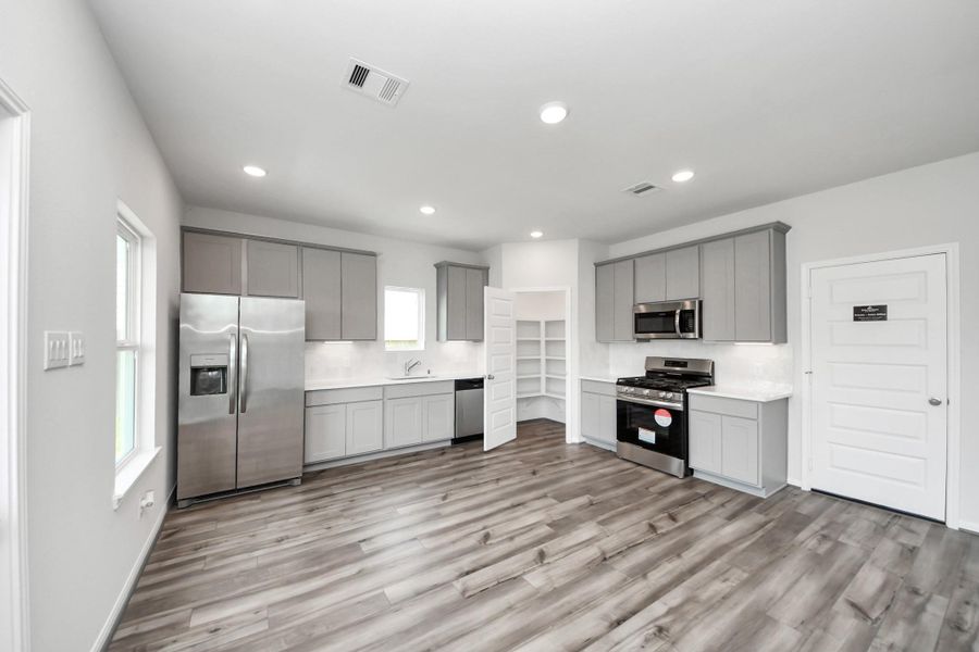Furnished interior view inside a new home in Hill and Dale Ranch, Splendora (Image 4).