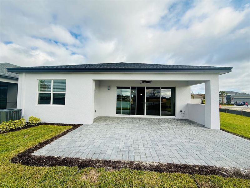 Exterior details and patio area of a home in Valencia Ridge, Wesley Chapel (Image 3).