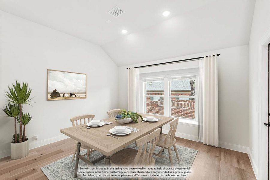 Dining room with wood table, four chairs, vaulted ceiling, and large window with white curtains