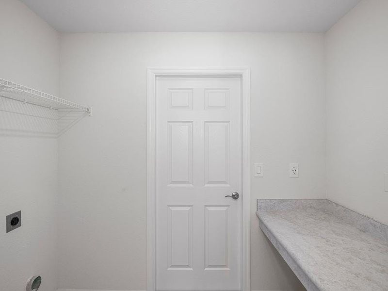 Thoughtful features such as this laundry room with drop zone are included throughout. Thoughtful features such as this laundry room with drop zone are included throughout.