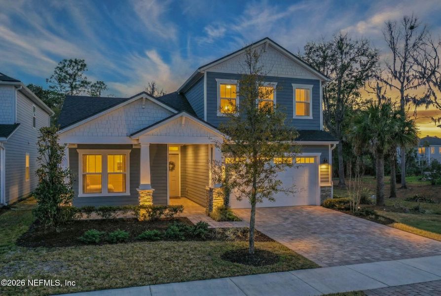 Front exterior of a new home in , St. Johns, FL, highlighting curb appeal (Image 28).