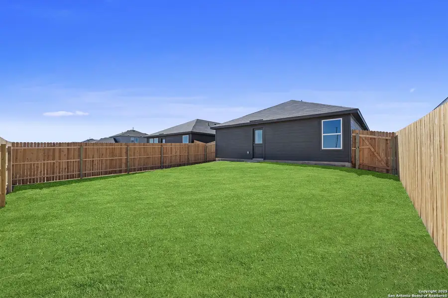 Exterior details and patio area of a home in Randolph Crossing: Cottage Collection, Converse (Image 2).