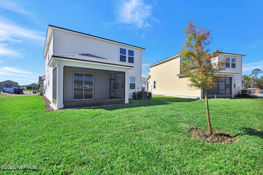 Exterior details and patio area of a home in The Preserve at Bannon Lakes, St. Augustine (Image 16).