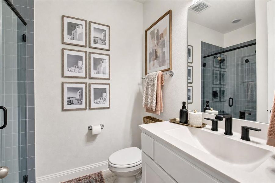 A full bath is adjacent to Bedroom #2