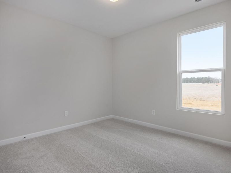 Spacious, unfurnished interior of a new home in Retreat at North Main, Lillington (Image 13).
