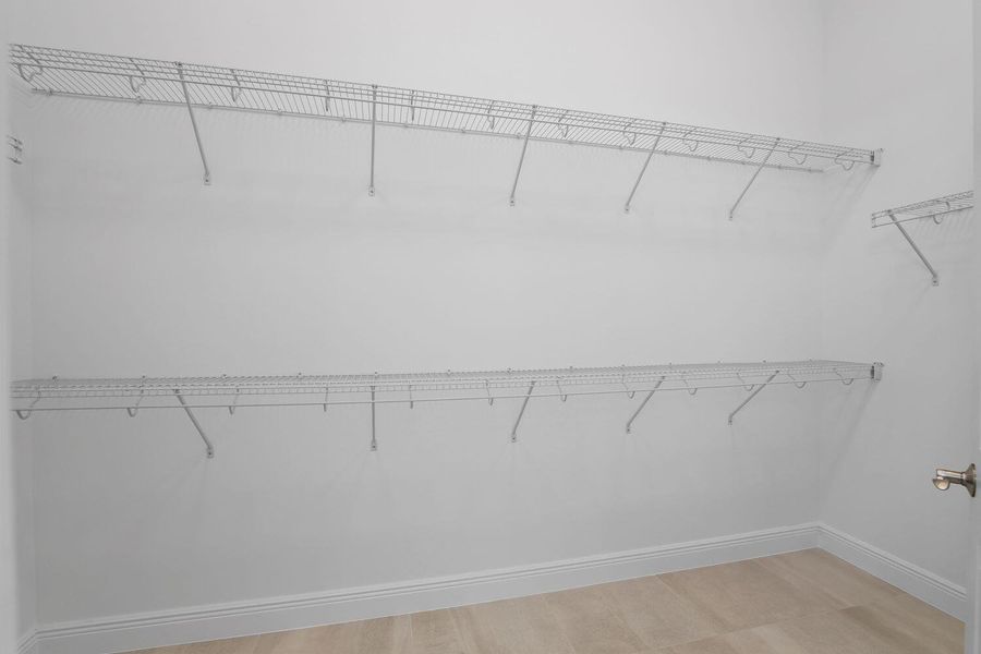 Furnished interior view inside a new home in Cresswind Palm Beach at Westlake, Westlake (Image 29).