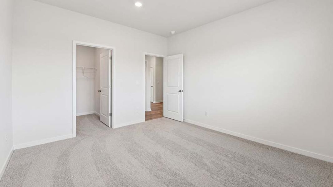 Spacious, unfurnished interior of a new home in Cardinal Creek, Charlotte (Image 20).