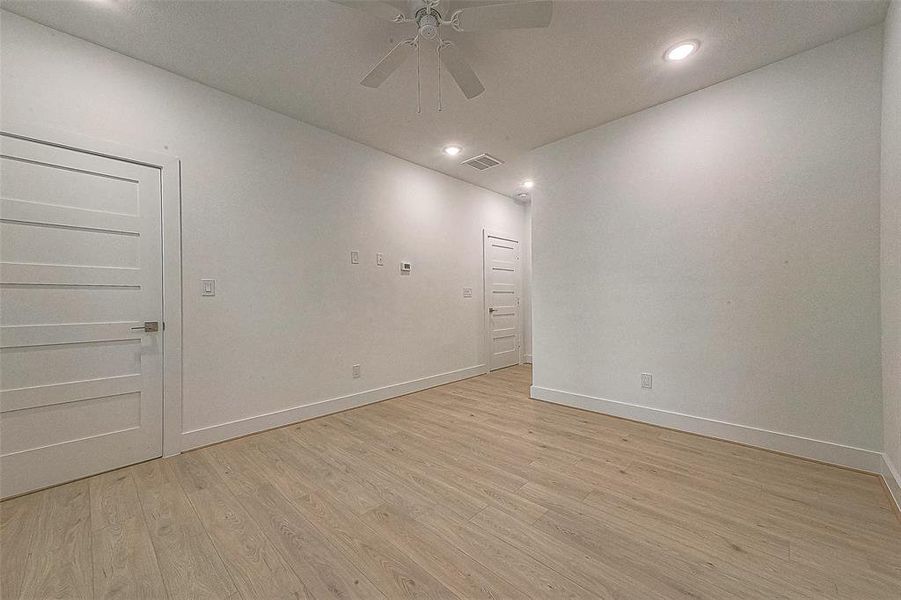 The bedroom is 13x11 and one of the walk-in closets is on the left. The room is light and airy and gives an elegant but still comfy feel.