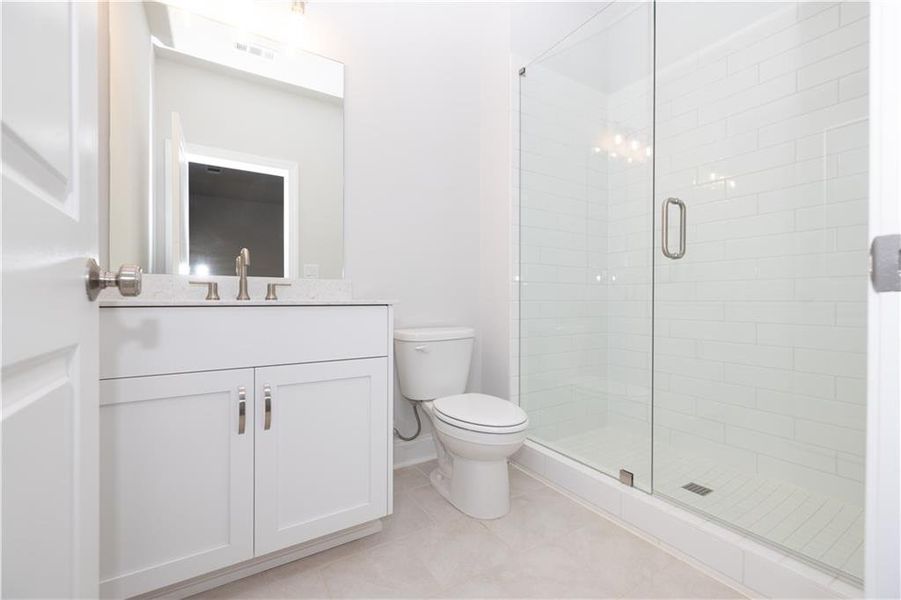 Furnished interior view inside a new home in Brackley Single Family, Cumming (Image 22).