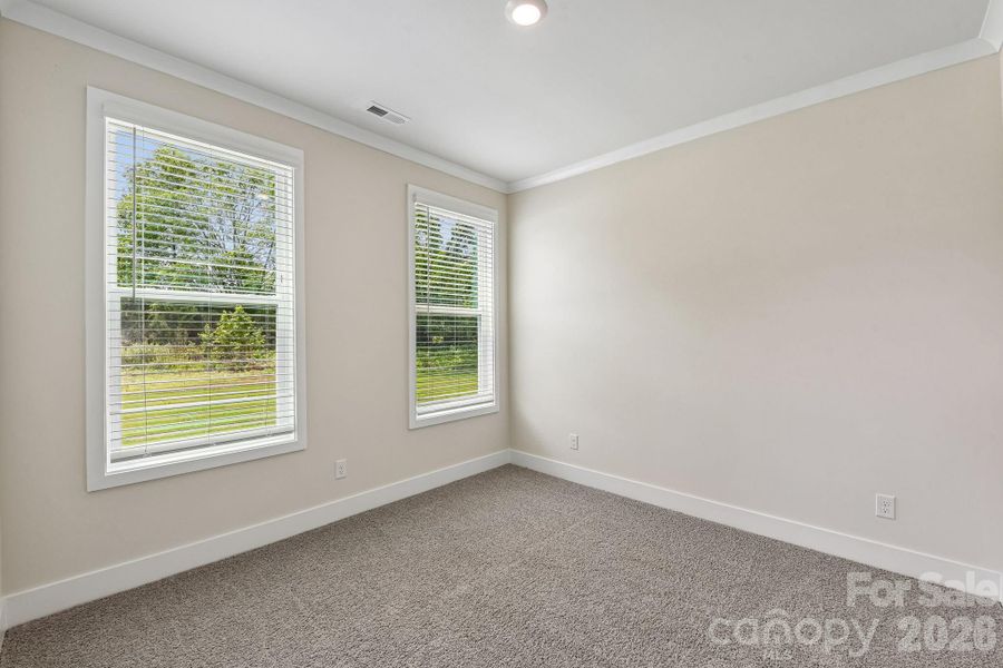 Spacious, unfurnished interior of a new home in Sanctuary at Southgate, Indian Trail (Image 26).