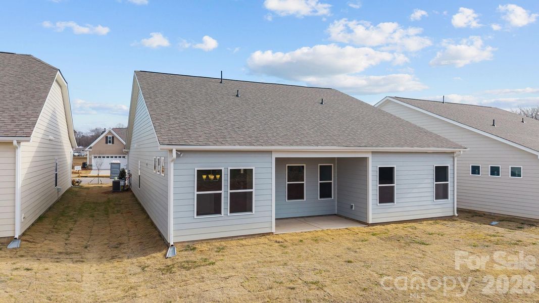 Exterior details and patio area of a home in Cottages at Wingate, Wingate (Image 3). Exterior details and patio area of a home in Cottages at Wingate, Wingate (Image 3).