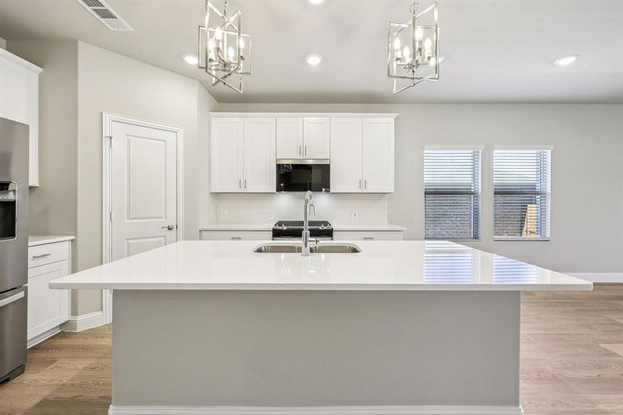 Photo is not of the actual home, but is an inspirational photo of builder’s model home and may depict options, furnishings, and/or decorator features that are not included.