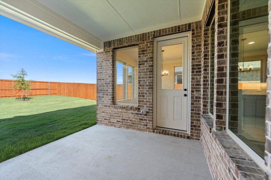 Exterior details and patio area of a home in Morningstar, Aledo (Image 28).