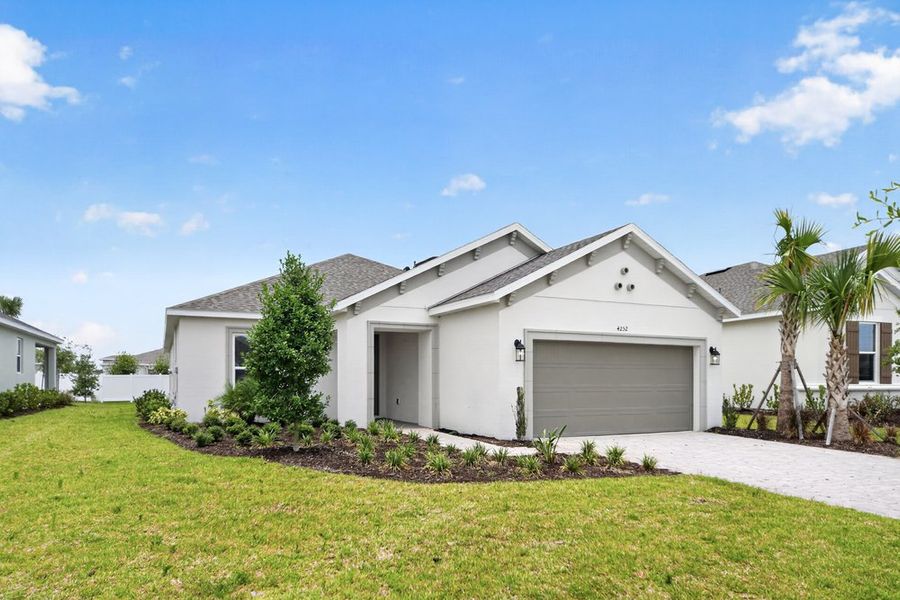 Front exterior of a new home in Westview Community Group Page, Kissimmee, FL, highlighting curb appeal (Image 2). Front exterior of a new home in Westview Community Group Page, Kissimmee, FL, highlighting curb appeal (Image 2).